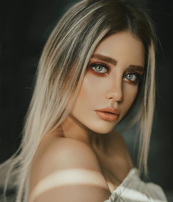 Young woman looking into the distance with clarity and calm expression